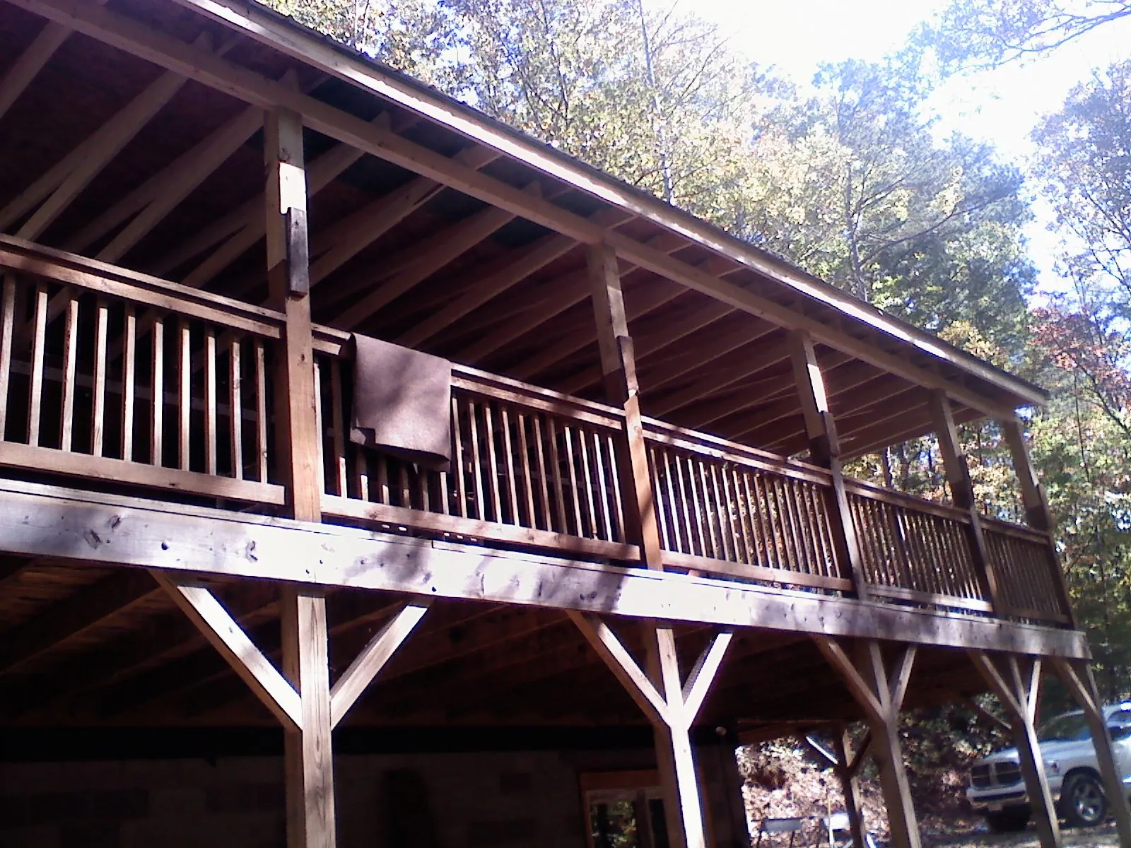 Timber framing under a new elevated porch and deck — Roof Leak Repair in Drummond by Roofing Brothers